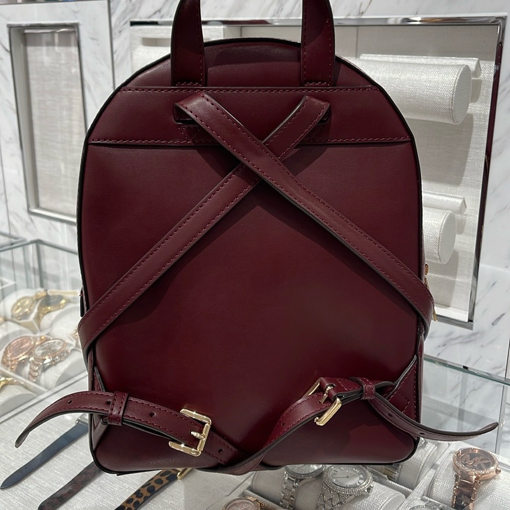 Michael Kors Jaycee Medium Pebbled Leather Backpack
 Oxblood/Golden 
NWT - Picture 14 of 16